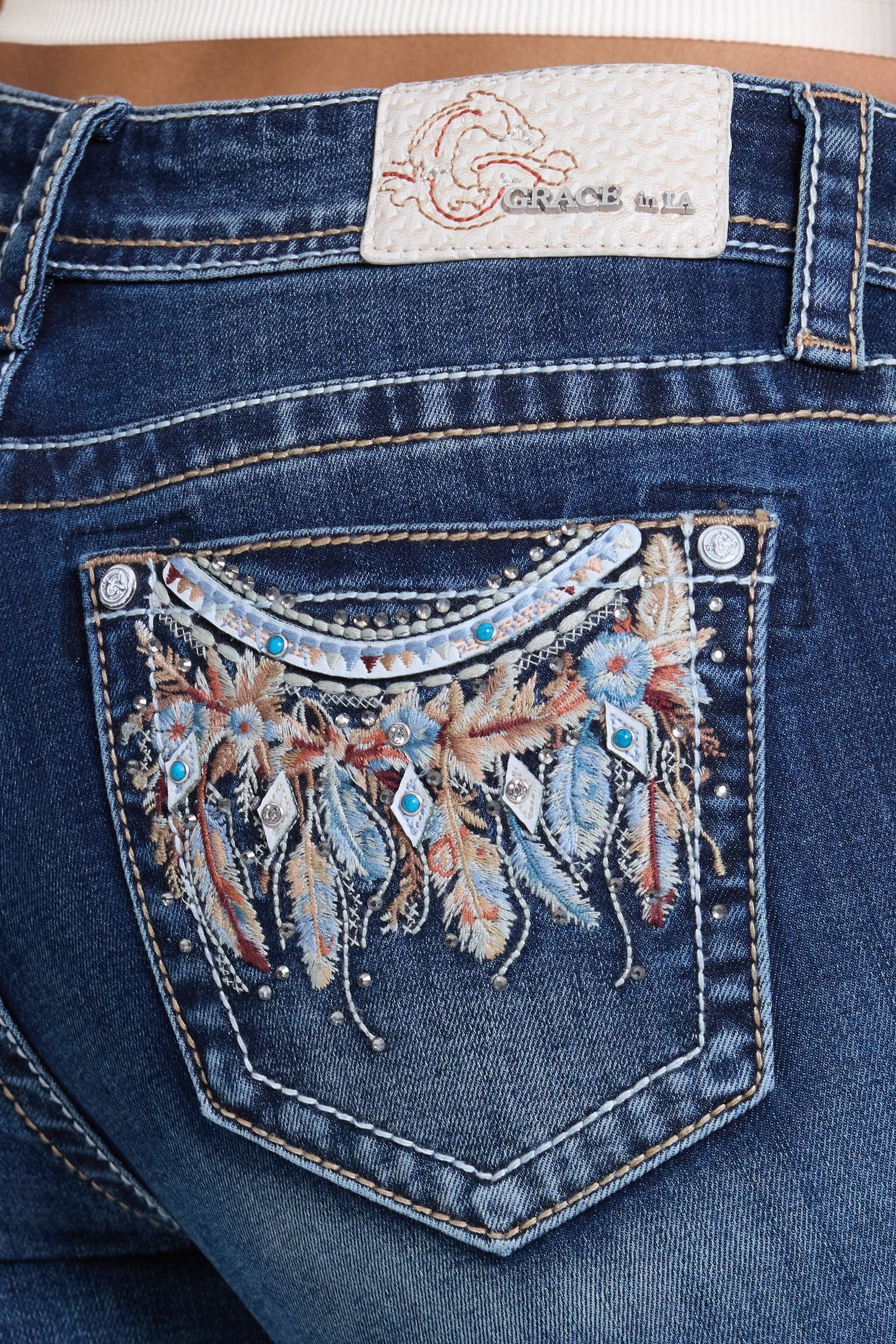 Feather pocket stitch detail